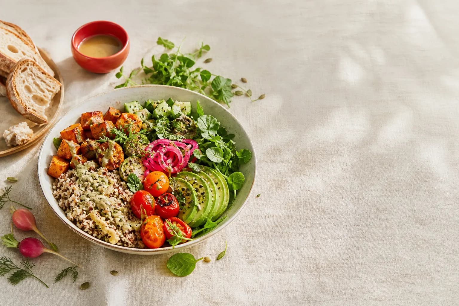 Colorful seasonal grain bowl in the Gather & Grain concept